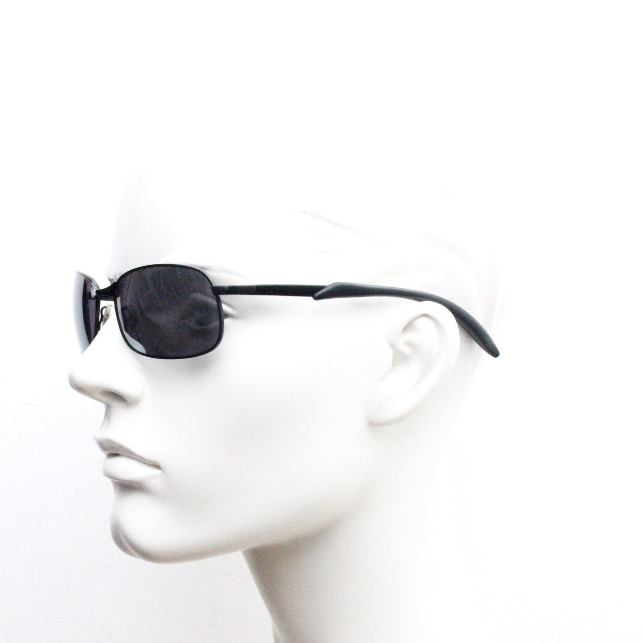 Y2K vintage wraparound sunglasses. Black satin matt finish on rectangular frame with slight mirror glaze lenses. 2000's. 90s. Unused NOS