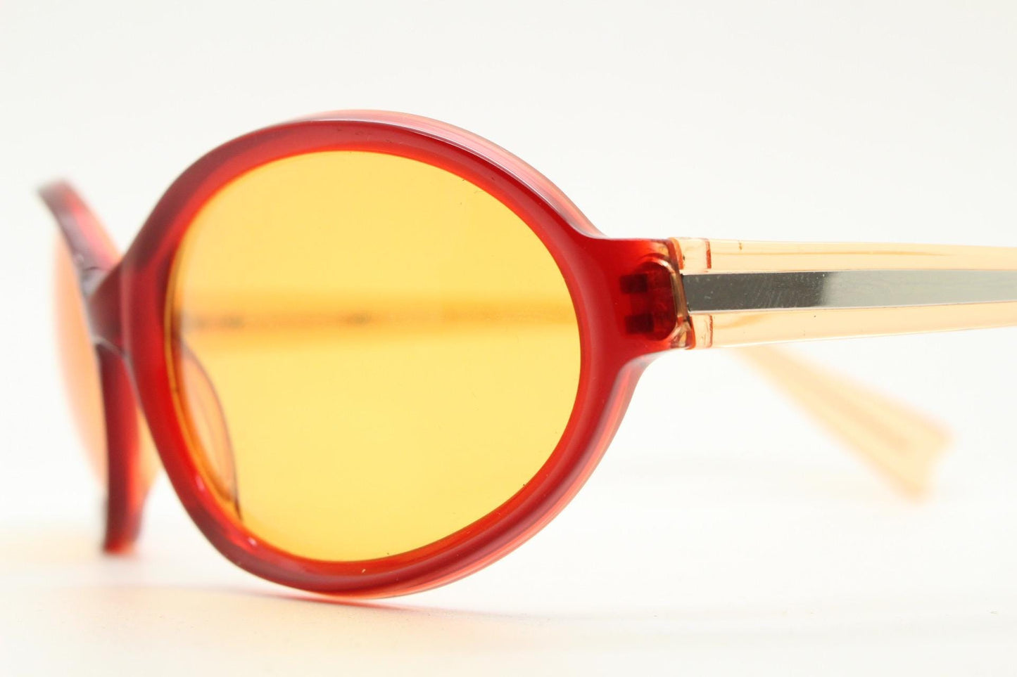 Alain Mikli Y2k vintage mini goggle sunglasses. Red transparent oval curved frame with blazing orange lenses. Definitive 2000s NOS
