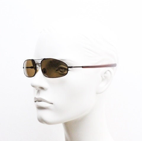 90s vintage abstract rectangular sunglasses. Metallic bronze satin finish frame with brown lenses and straight arms. 2000's. NOS aviator