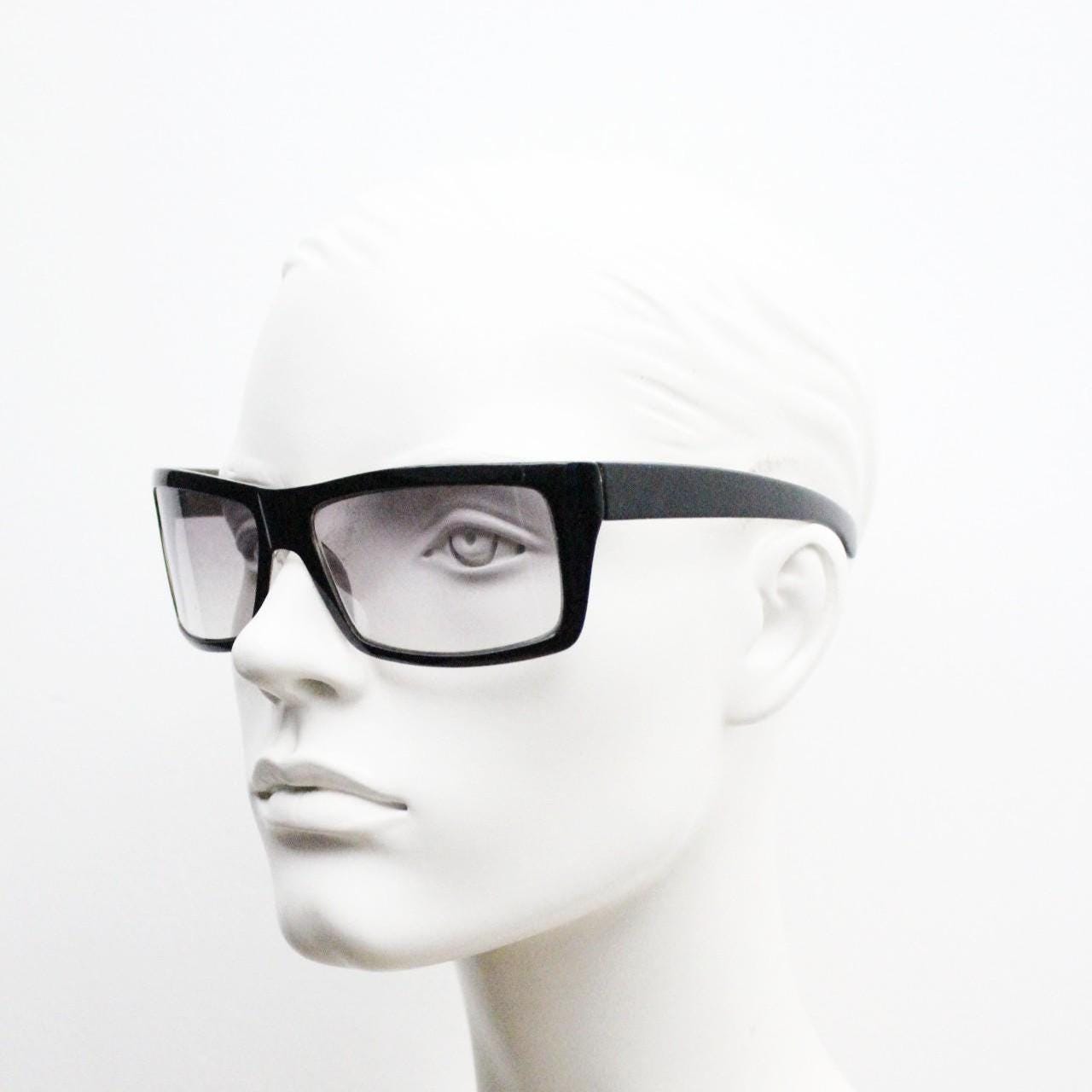 Y2k vintage wrap around large rectangular sunglasses. Curved black gloss frame with tasteful graduating lenses. 2000's NOS