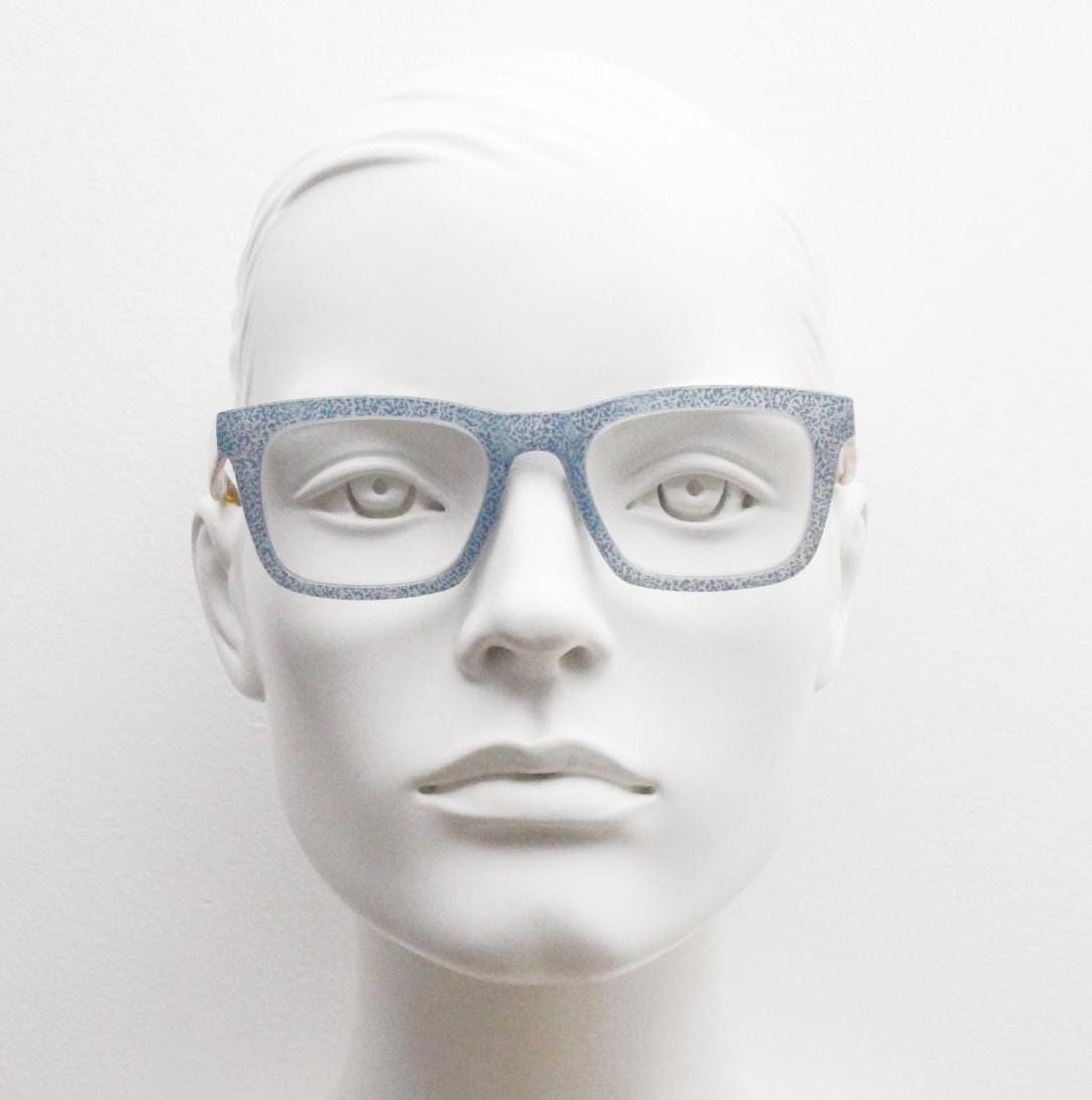 Rectangular Y2K horn rim eye glasses. Contrasting tortoise arms and speckled blue denim look optical frames. Prescription vintage spectacles