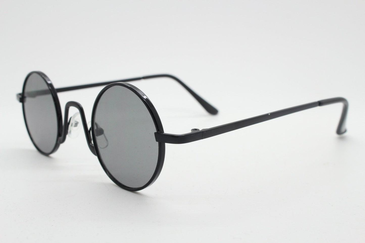 90s vintage small oval sunglasses. Imposing minimal black victorian style frame with dark grey lenses. Steampunk. Unused BNWT
