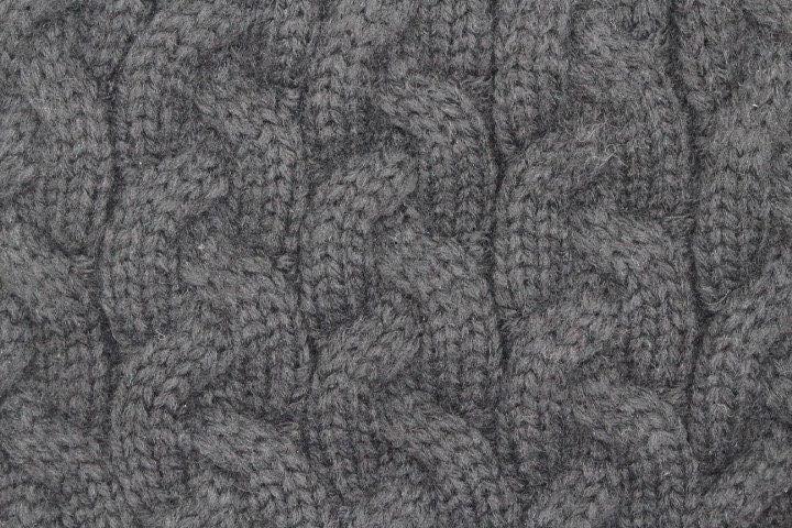 Ugg Australia plain black knitted beanie hat. Aran pattern weave with ribbed edge. Pull down cap. BNWT