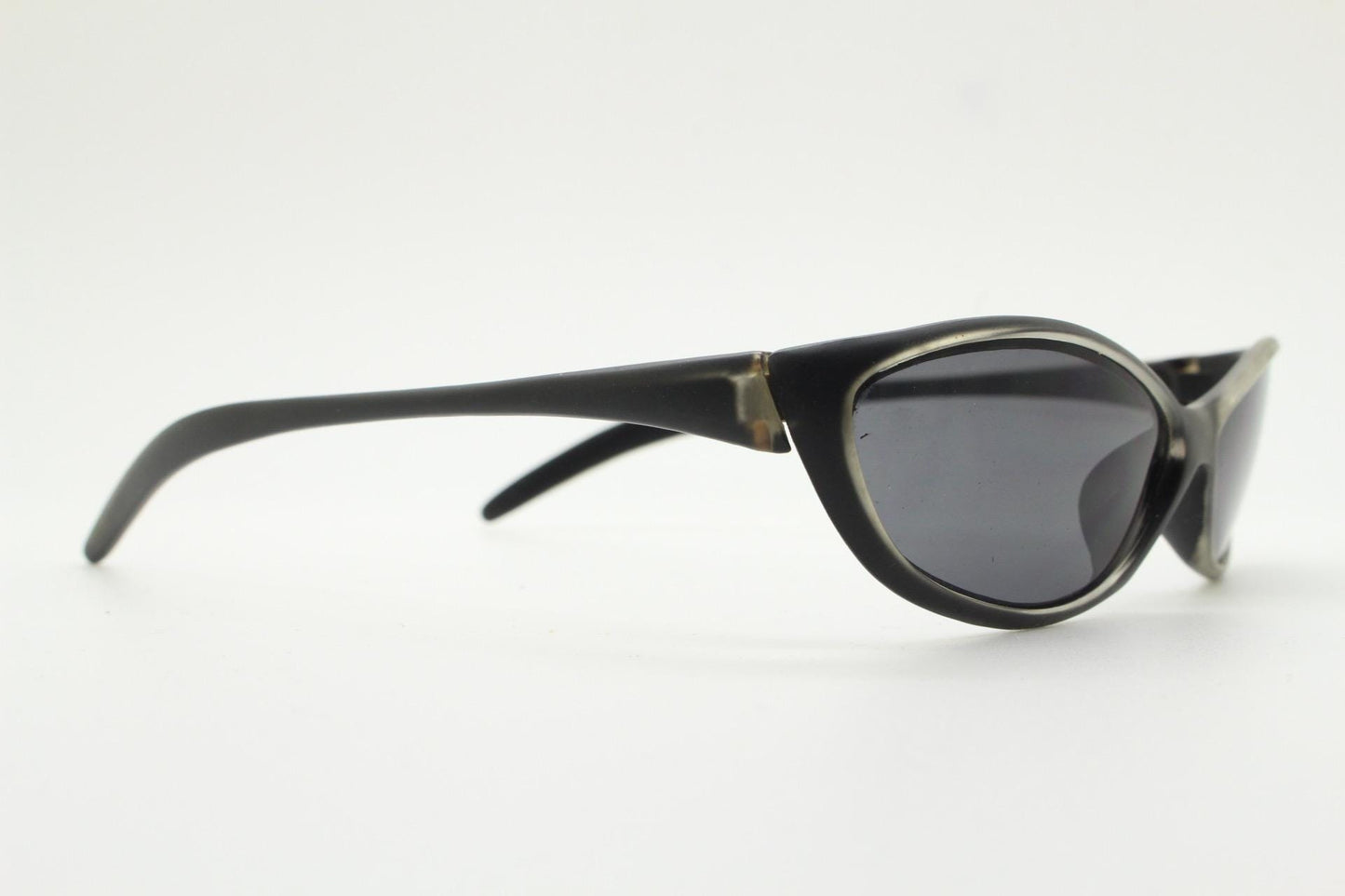 90s vintage curved wraparound sunglasses. Aerodynamic low profile transparent grey frosted frame. Minimal sporty shield design. NOS