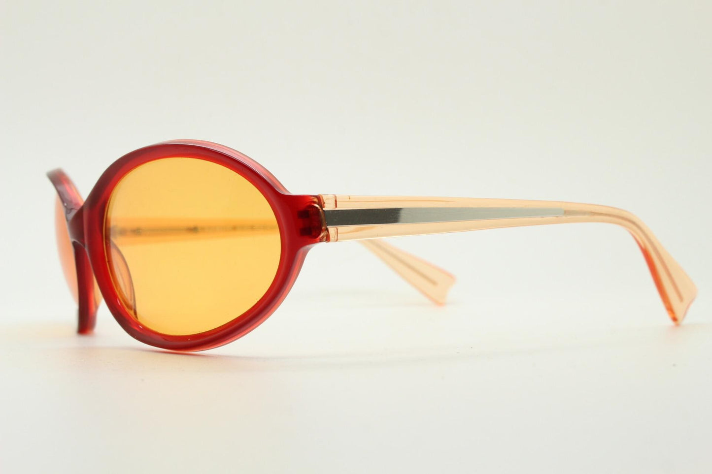 Alain Mikli Y2k vintage mini goggle sunglasses. Red transparent oval curved frame with blazing orange lenses. Definitive 2000s NOS
