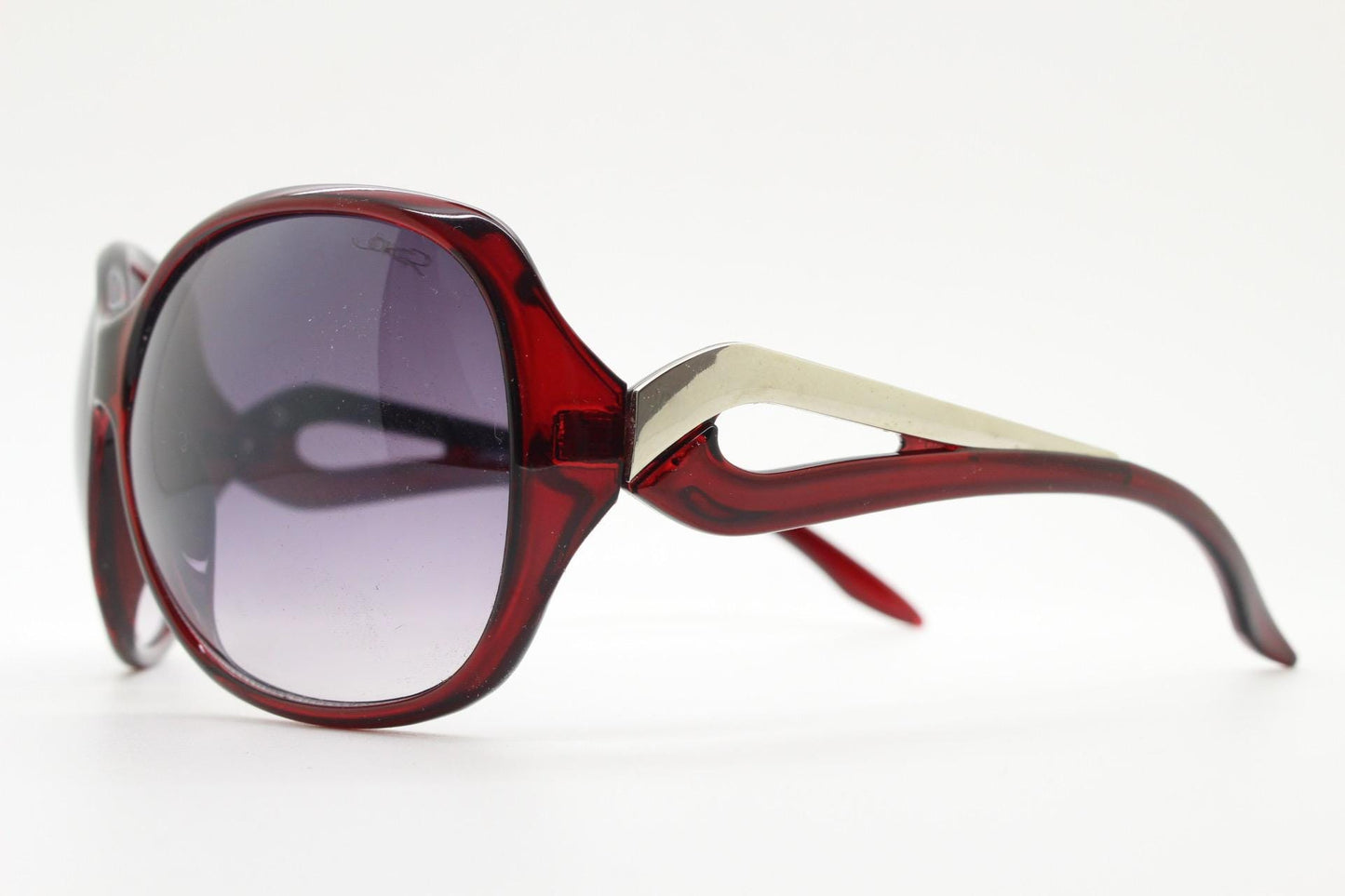 Y2k vintage oversized womens sunglasses. Big bug eye 70s design in deep red with metal arm detail. Authentic 2000s retro. NOS