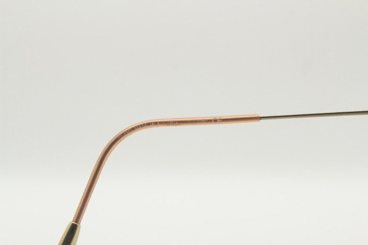 Silhouette oval half frame eye glasses model 6608 made in Austria. Minimal optical frame with extremely flexible wire arms. Prescription RX