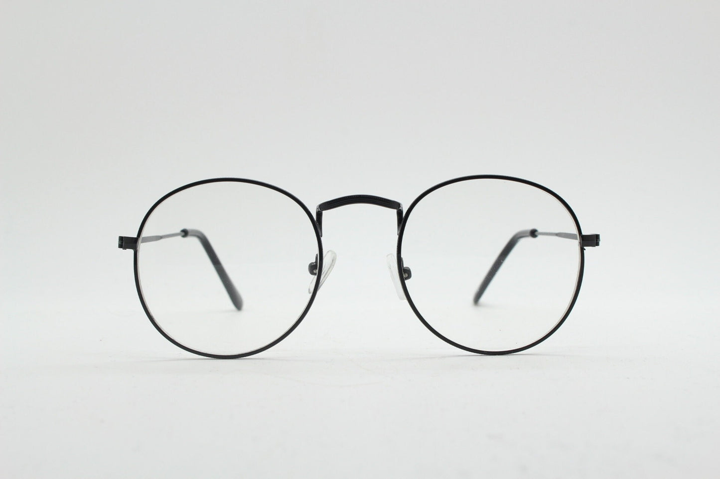90s vintage round metal glasses. Classic 60s panto design black frame with clear lenses in excellent proportions. Unused NOS eyeglasses