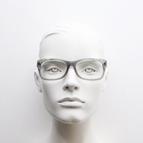 Alain Mikli rectangular eye glasses made in France. Dynamic black and white striped layered acetate grey optical frame. Prescription RX