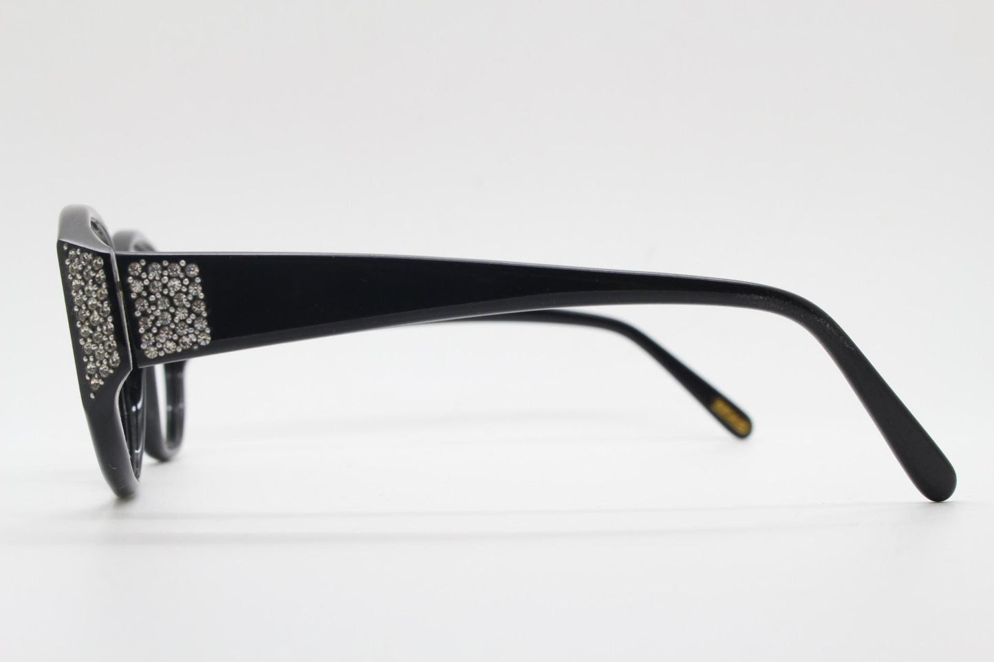 Versace modified cropped cat eye glasses made in Italy. Black gloss acetate optical frames with dramatic diamante. Prescription. Vintage NOS
