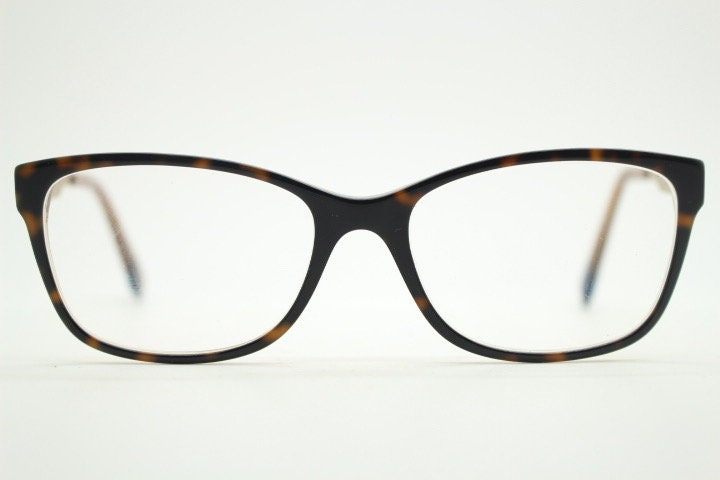 Gant vintage modified cat eye glasses model 4060. Tortoise acetate and satin metal arm cateye optical frames. Womens prescription spectacles