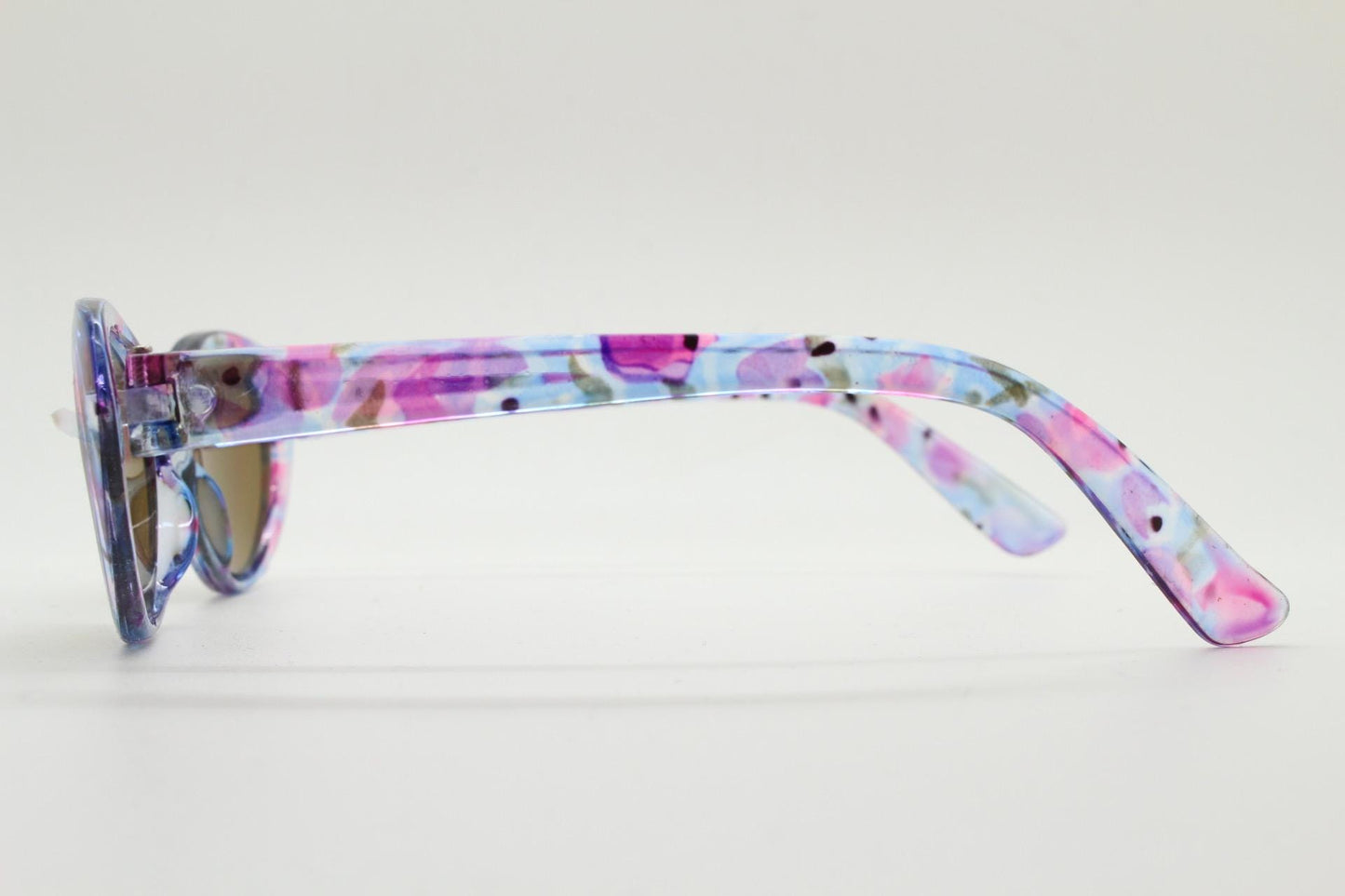 90s vintage oval cat eye sunglasses. Vibrant transparent multi coloured frame with mid tone brown lenses. 80s. NOS. BNWT
