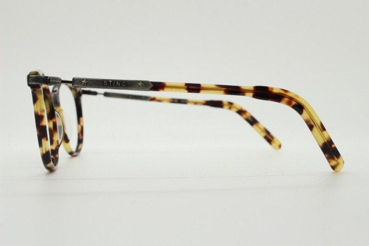 Sting 90s vintage round eye glasses made in Italy. Honey tortoise acetate optical frames. 40s retro design. Prescription eyeglasses. RX