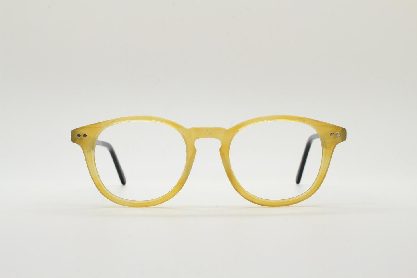 Entrostyle vintage round 40s design eye glasses. Beeswax coloured acetate optical frame with keyhole bridge and black arms. Prescription RX