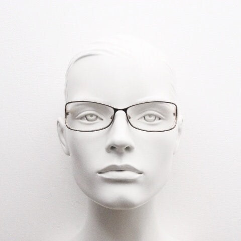 Givenchy eye glasses in brown chrome with beige acetate arms and gold diamante detail. Rhinestone optical frames. Prescription eyeglasses RX