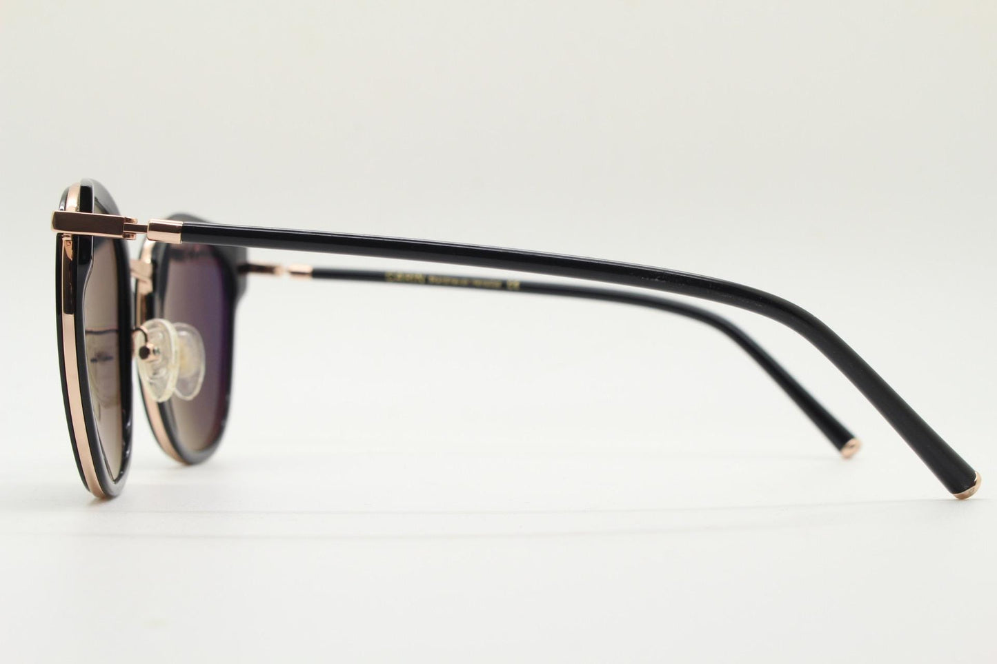 Carin round cat eye sunglasses, Gold metal frame with black cateye insets and matched dark tone lenses and slender arms