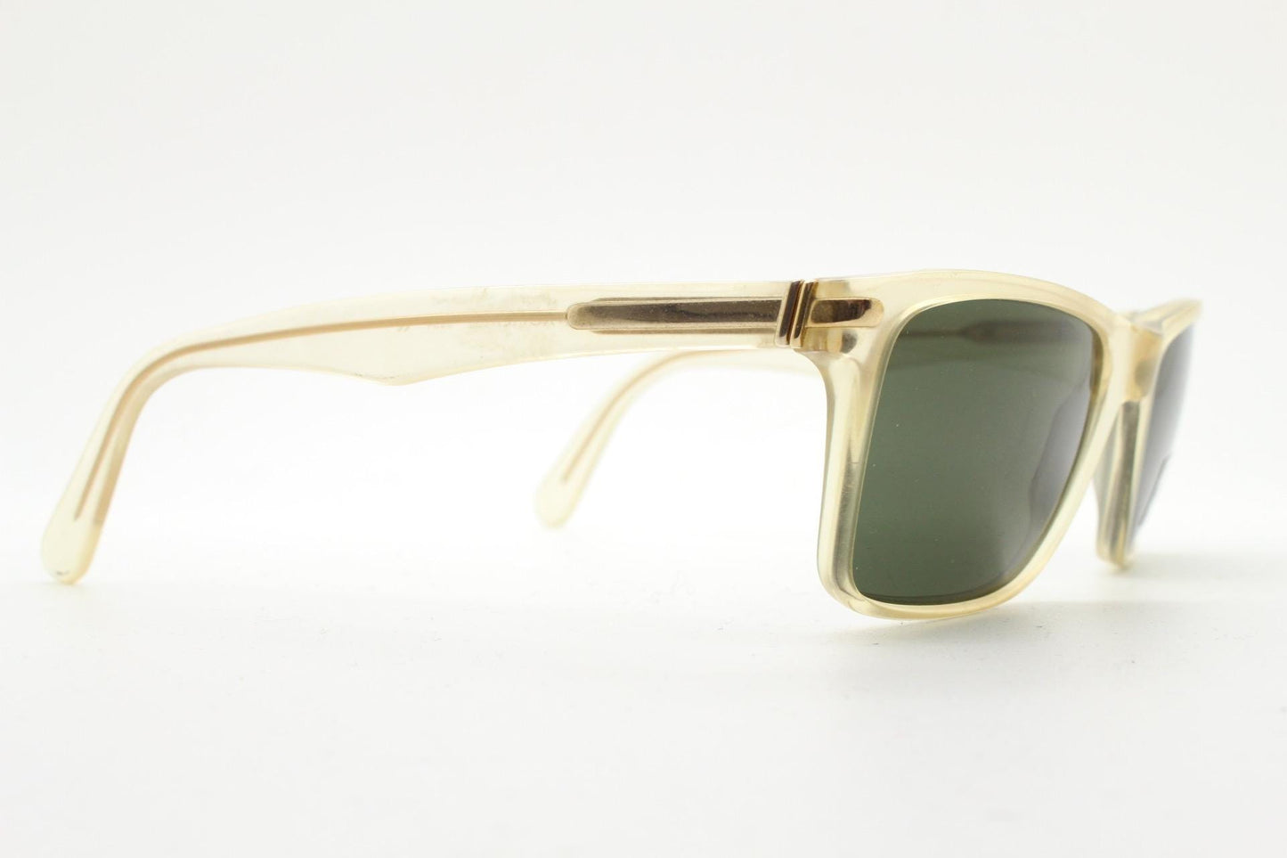 Luxottica 90s vintage rectangular sunglasses made in Italy. Transparent yellow acetate chunky frame with contrasting dark green lenses. BNWT