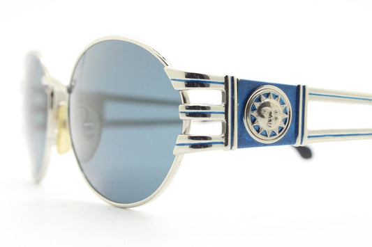 Sunsweet 90s vintage metal oval sunglasses made in Italy. Definitive ornate temple design with classical sun crests in silver chrome. NOS