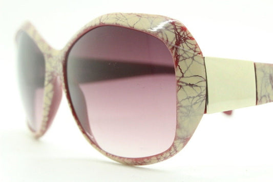 2000s s vintage abstract round sunglasses by Liz Claiborne New York. Psychedelic beige crackle print bug eye with graduating lenses. Y2K NOS