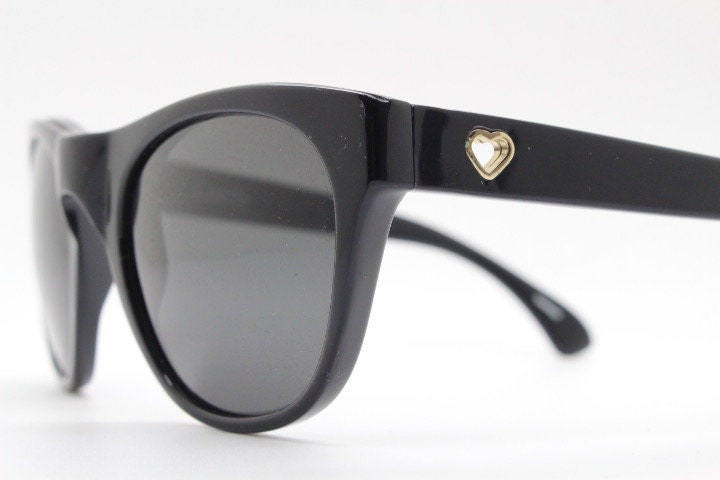 Linda Farrow Collaborations sunglasses with LUELLA. Limited production black acetate chunky wayfarer design with heart crests. NOS vintage