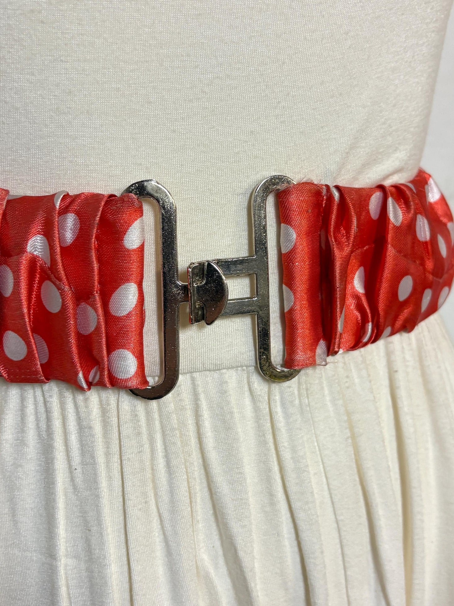 80s vintage womens elastic red with big white polka dots stretch belt. Flattering cinch for a dress. Chrome buckle. Minnie mouse cosplay