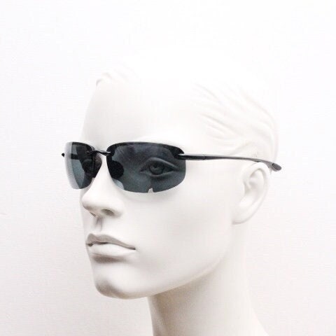 Maui Jim sport wrap around sunglasses made in Japan. Lightweight half frame shield with curving lenses. 2000's. Y2K