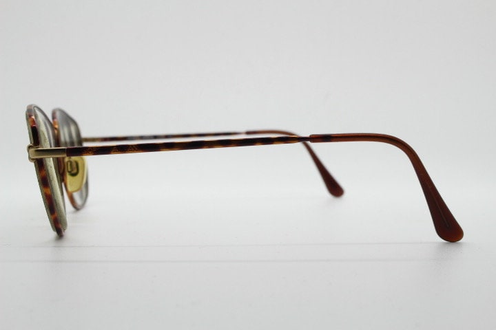Giorgio Armani 90s vintage angular squared eye glasses made in Italy. Subtle metallic satin tiger print optical frames. Prescription RX