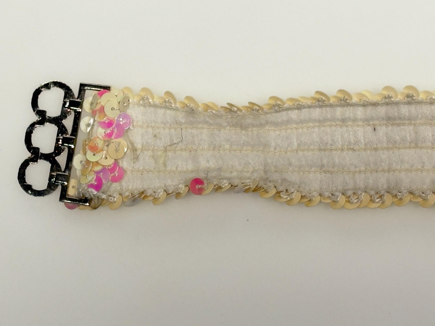70s vintage womens elastic pink and white sequin stretch belt with chrome circles buckle. To wear with a dress. Authentic disco belt