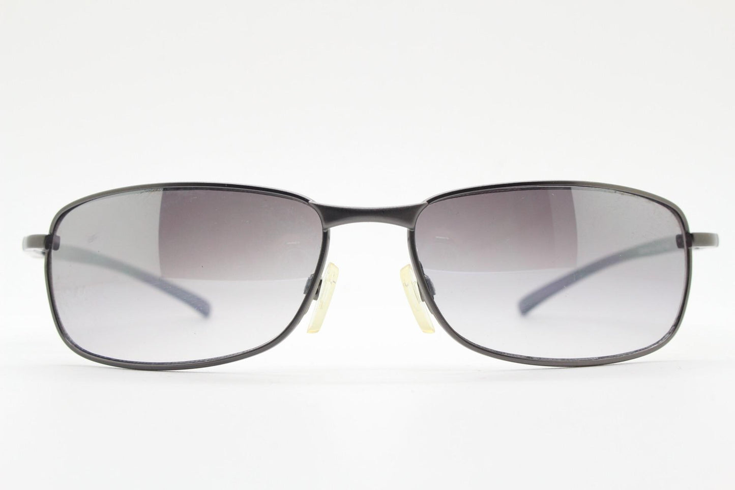 90s vintage curved rectangular sunglasses. Metal low profile frame in grey chrome with frosted arms and mirrored lenses. 2000's. Y2K NOS