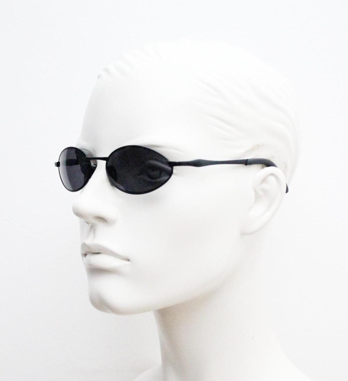 90s vintage small oval bug eye sunglasses. All black matt finish frame. Classic Matrix shape. Cosplay. Unworn NOS
