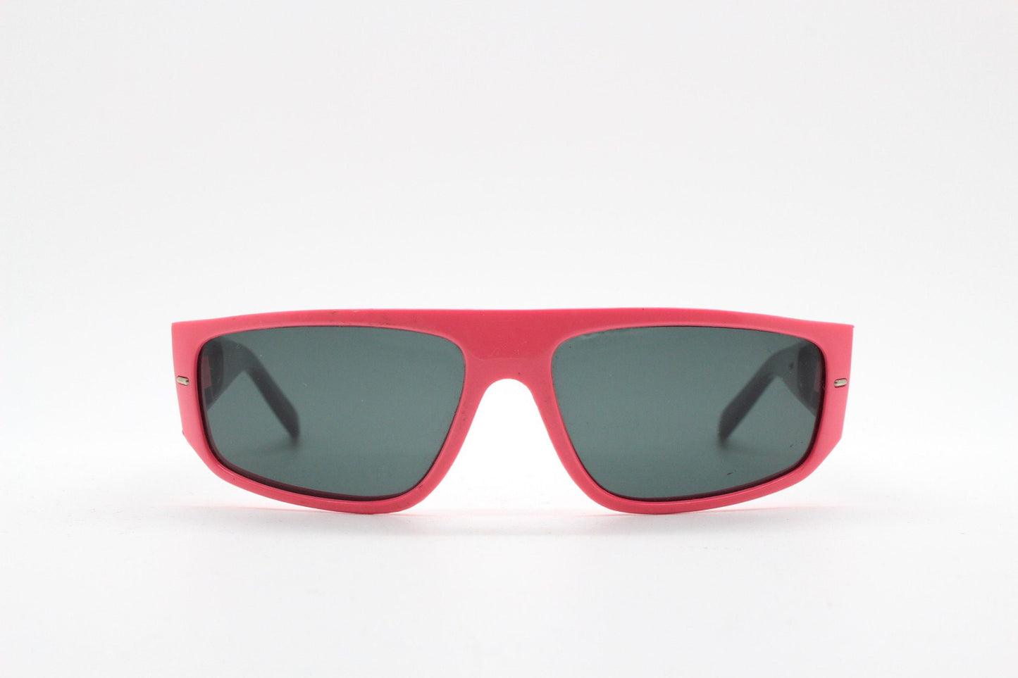 80s vintage 2 tone sunglasses. Aerodynamic flat top shield style wrap around frame in pink and black with real glass lenses. Unused NOS