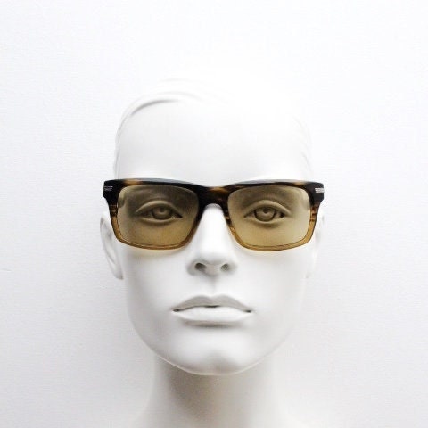 Oliver Peoples vintage rectangular sunglasses model Maceo. Handsome transparent mottled honey brown acetate frame with mid tone lenses