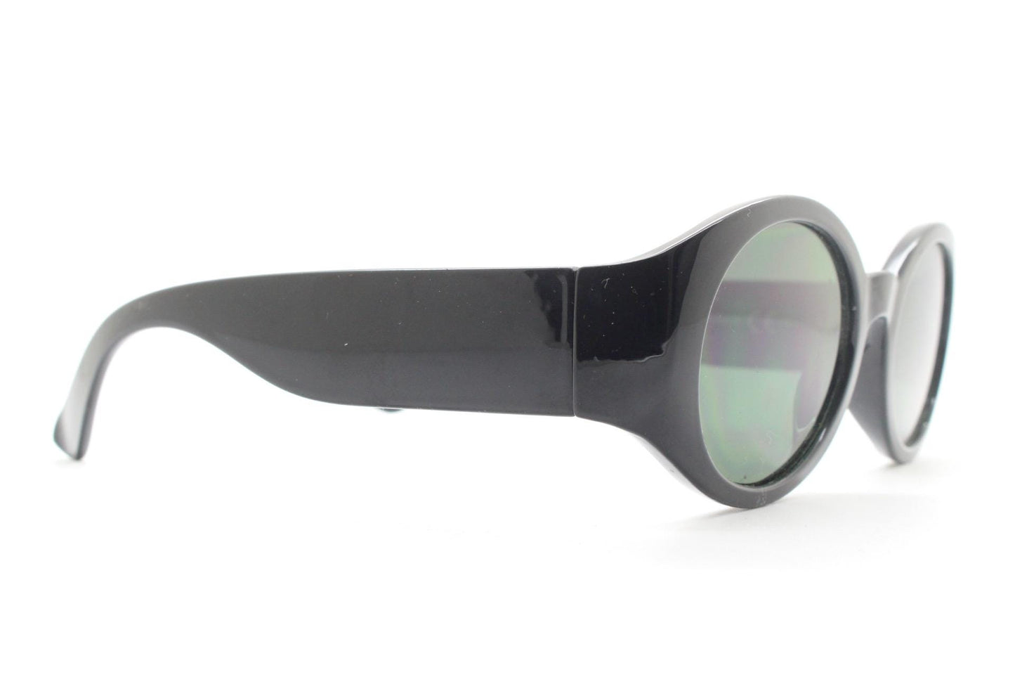 Y2k vintage tall arm oval sunglasses. 60s design black frame with curved sides and green lenses. Unused NOS. Mod. Beatnik