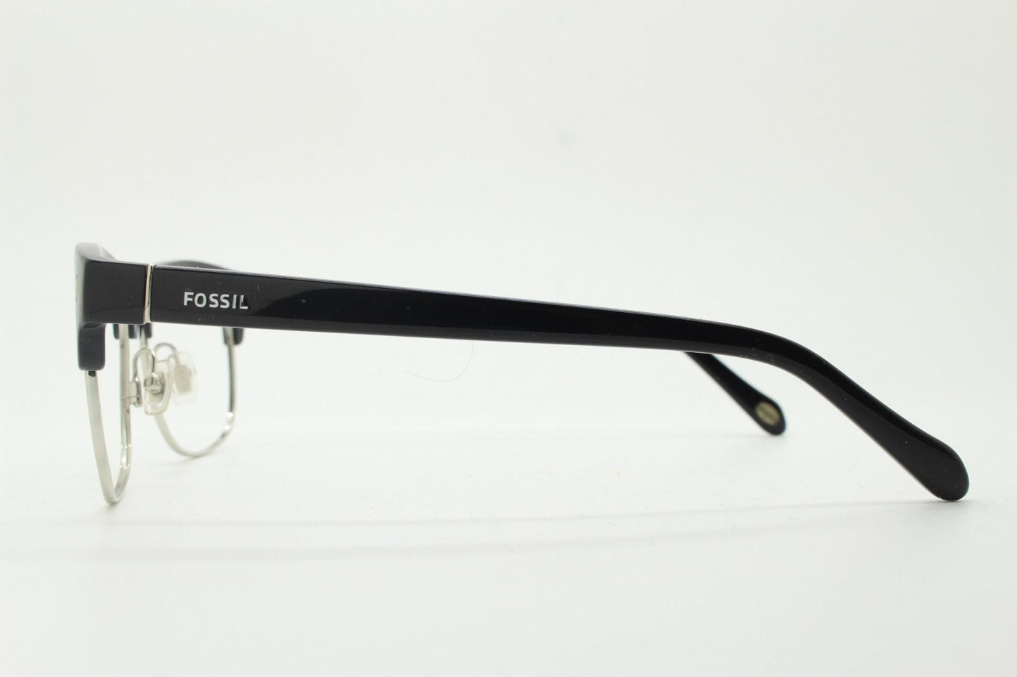 Fossil brow line eye glasses. Sharp and clean clubmaster format. Silver optical frames with black browline. Prescription eyeglasses. RX