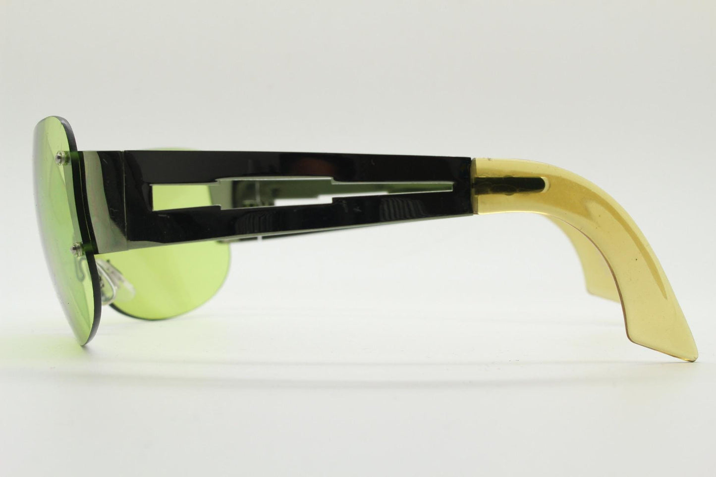Y2K vintage frameless shield sunglasses. Dynamic 2000's green mono lens visor with matching coloured chrome arms. 00's Cosplay mini mask NOS