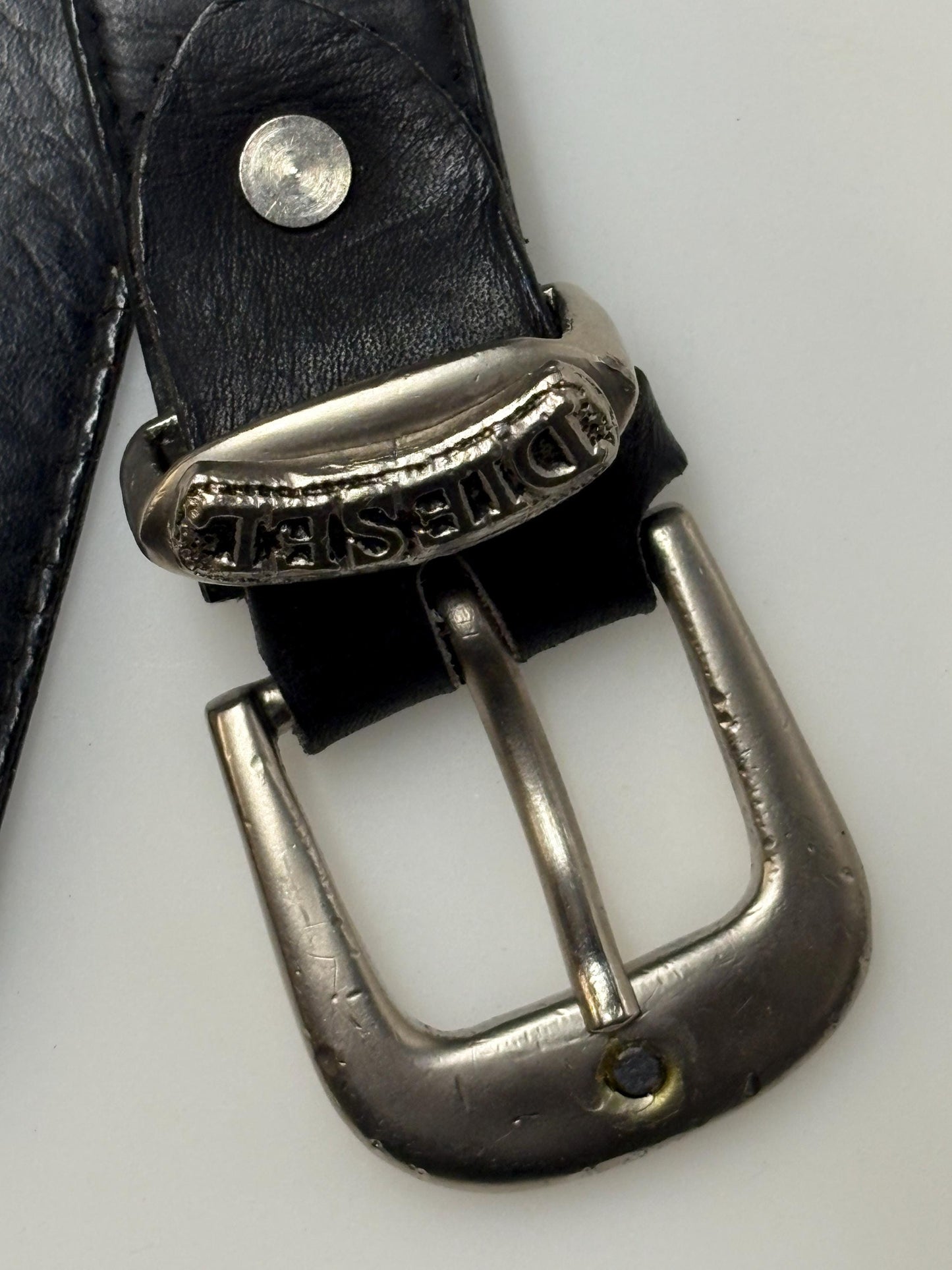 Diesel 90s vintage thick black genuine leather belt for jeans. Superior quality with silver buckle and simple script logo. Textured cowhide
