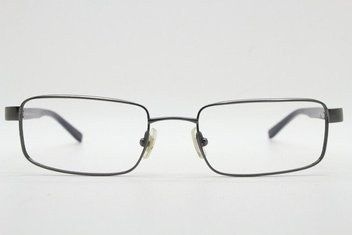 Calvin Klein collection rectangular eye glasses model 582 made in Japan. Gunmetal grey wire optical frames. Prescription eyeglasses. RX