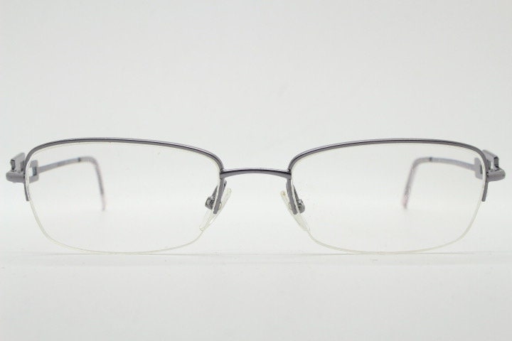Gucci rectangular eye glasses made in Italy. Slim metal wire low profile optical half frame with diamante logo. Prescription eyeglasses. RX