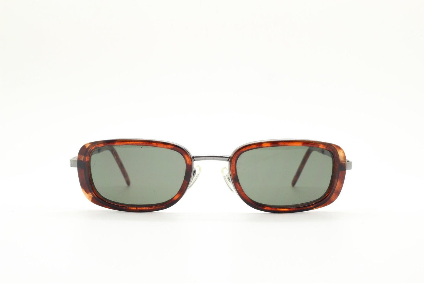 90s vintage rectangular sunglasses. Grey chrome metal frame with protruding tortoise insets, matching ear bends and green lenses