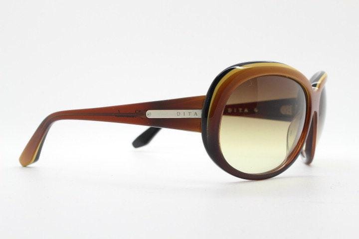 Dita oversized 70s design sunglasses model Pretender made in Japan. Gorgeous brown and black layered acetate. Womens NOS. 60s