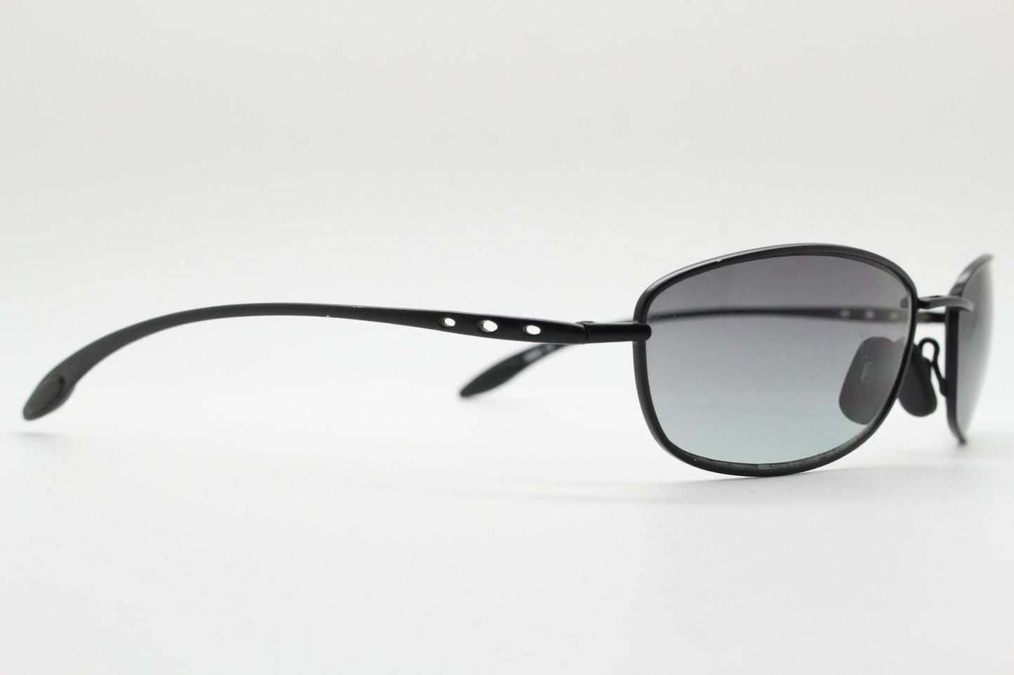 90s vintage curved rectangular sunglasses. Solid metal low profile black matt finish frame with slightly graduating lenses. 2000's. Y2K. NOS