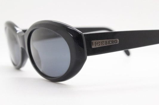 Iceberg 90s vintage oval cateye sunglasses made in Italy. Womens chunky plain black gloss acetate cat eye