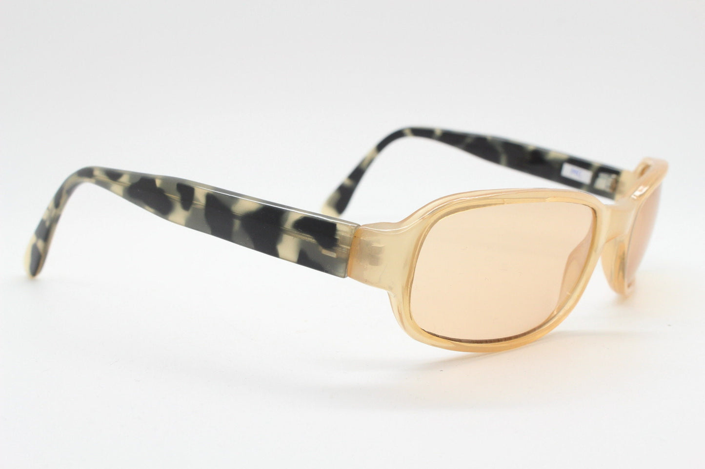 Y2K vintage curved rectangular sunglasses. Beige frame with matching lenses and contrasting tortoise arms. 2000s unused NOS. 00s