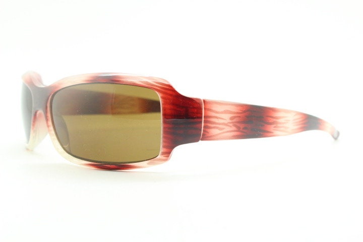 Vintage rectangular shield sunglasses. Transparent abstract red tiger print low profile visor style wrap around frame. Y2K NOS. 2000s