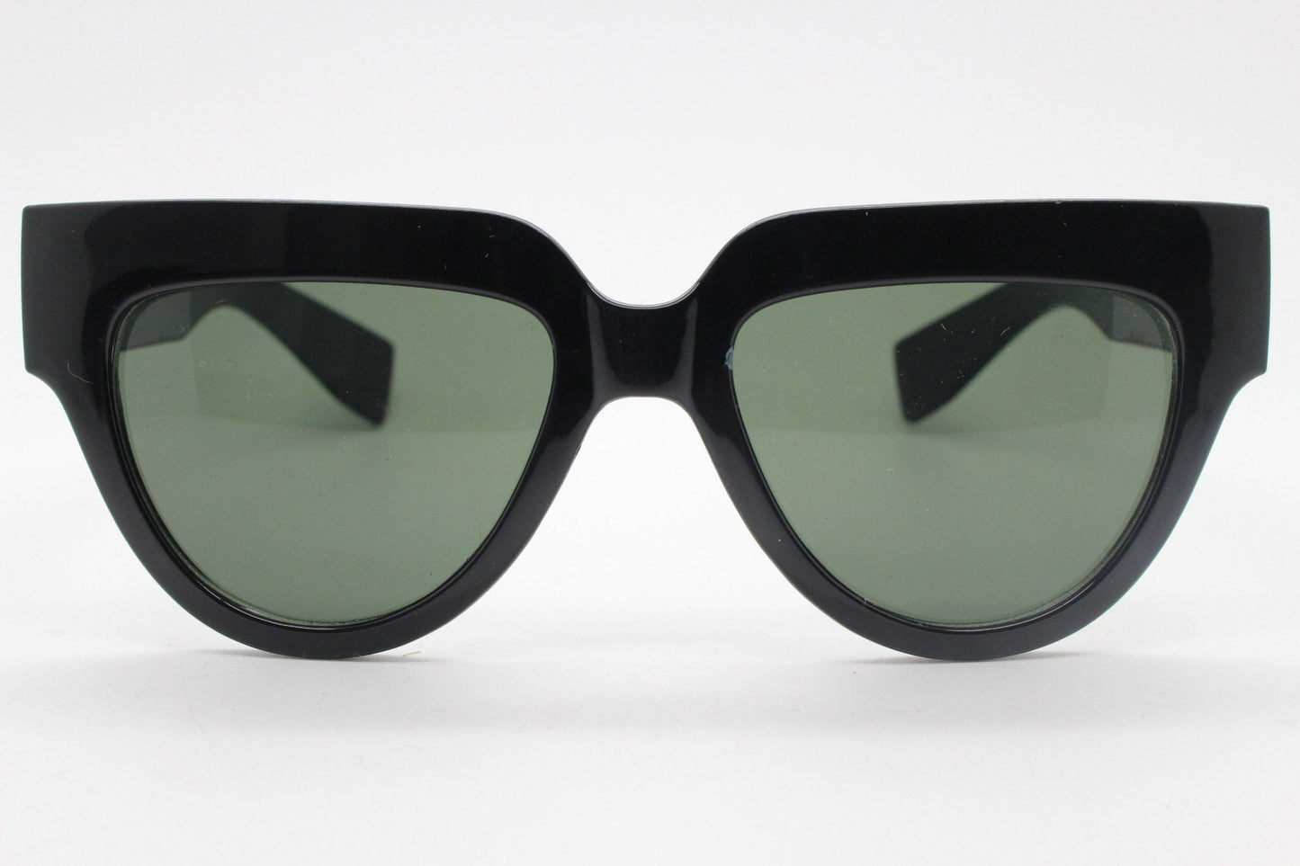 Vintage Y2K pointed cat eye sunglasses. Womens solid black 60s style flat brow cateye frame. Rockabilly. NOS catseye