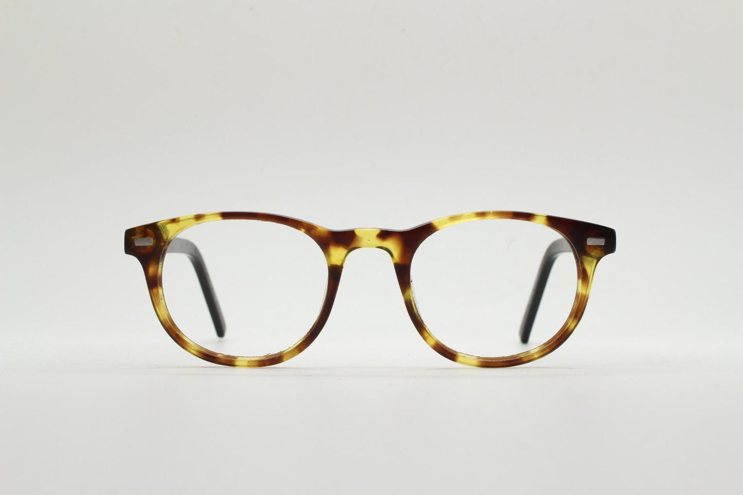 90s Vintage oval eye glasses. Tortoise gloss solid acetate 40s design optical frames with plain black arms. Prescription RX spectacles