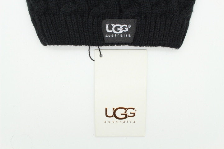 Ugg Australia plain black knitted beanie hat. Aran pattern weave with ribbed edge. Pull down cap. BNWT