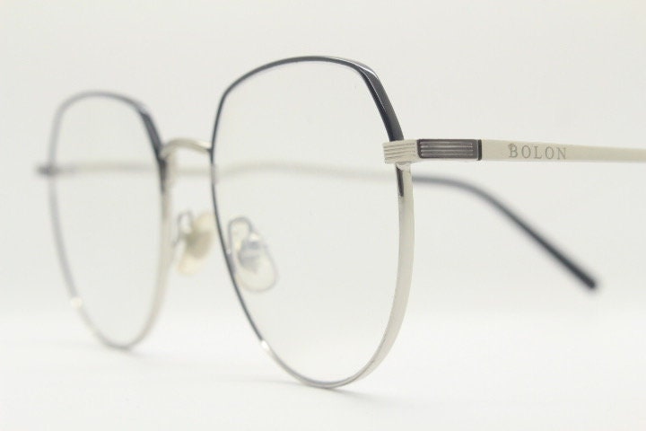 Bolon round panto flat top eye glasses model 7052. Slender silver metal optical frame with black brow. Prescription spectacles. Vintage RX
