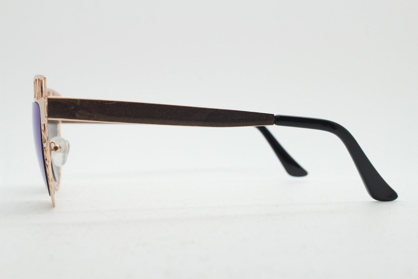 Y2K vintage metal cat eye sunglasses. Women's extraordinary gold cut out lattice scaffold cateye frame with blue mirror lenses. 2000s. BNWT
