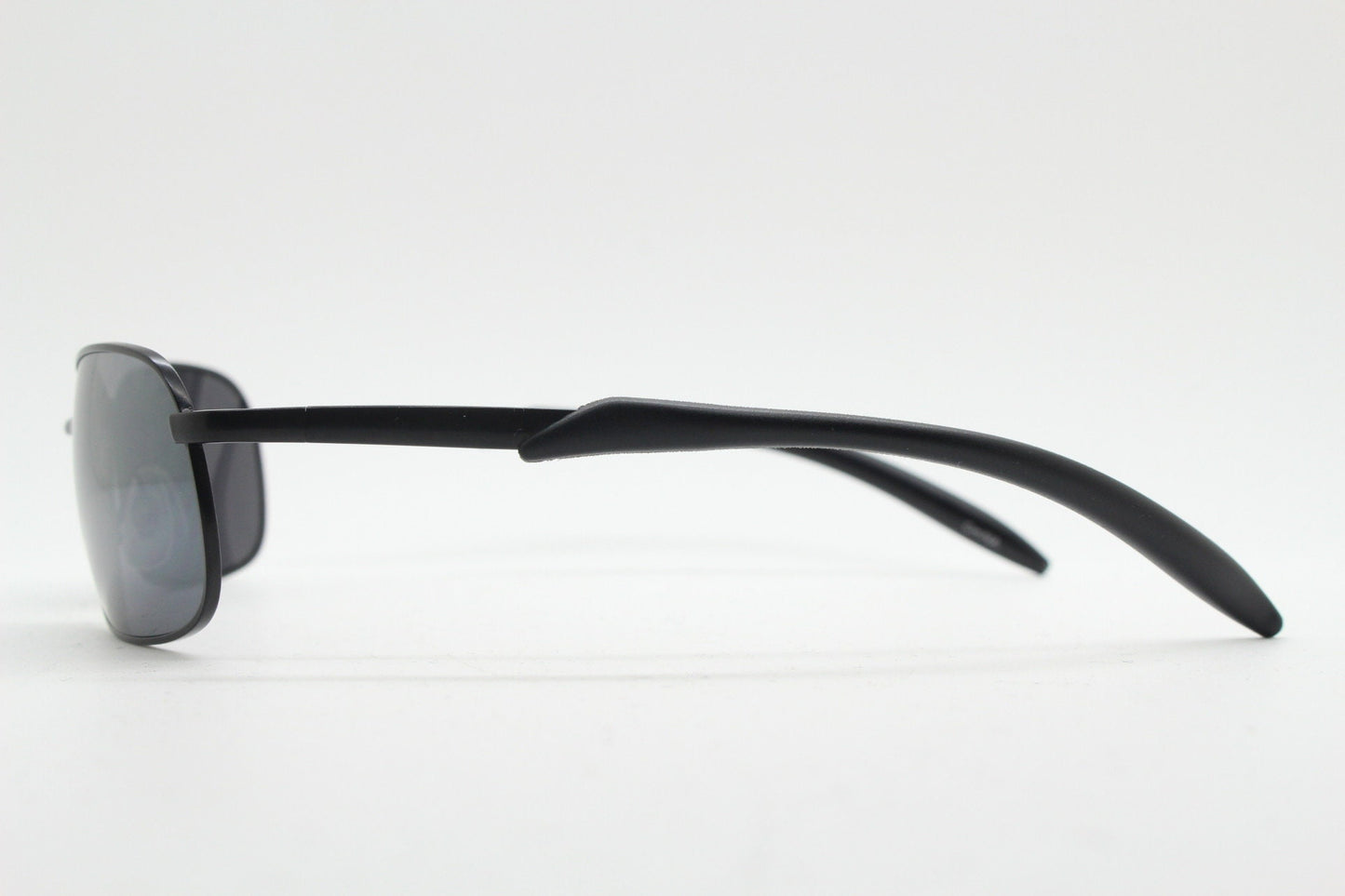 Y2K vintage wraparound sunglasses. Black satin matt finish on rectangular frame with slight mirror glaze lenses. 2000's. 90s. Unused NOS